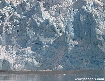 Calving ice falls from the Hubbard Glacier in Yakutat bay, Alaska