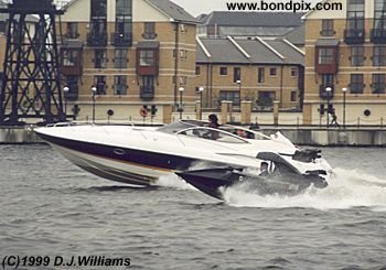On location with the action unit for the James Bond 007 film 'The World is not Enough'. An exciting boat chase filmed on the River Thames in London