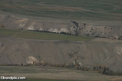 Aerial views over the Deer Lodge valley, Deer Lodge, Anaconda and Butte in Montana