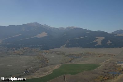 Aerial views over the Deer Lodge valley, Deer Lodge, Anaconda and Butte in Montana