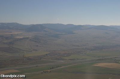Aerial views over the Deer Lodge valley, Deer Lodge, Anaconda and Butte in Montana