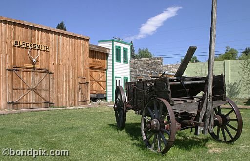 Deer Lodge Museums, Frontier Montana cabins, buildings, blacksmith shop and cart