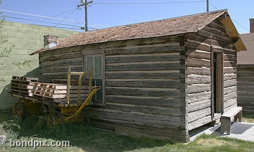 Deer Lodge Museums, Frontier Montana cabin and cart