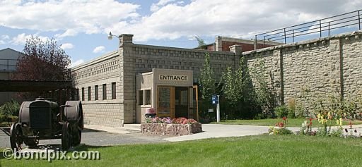 Deer Lodge Montana Auto Museum entrance and old tractor
